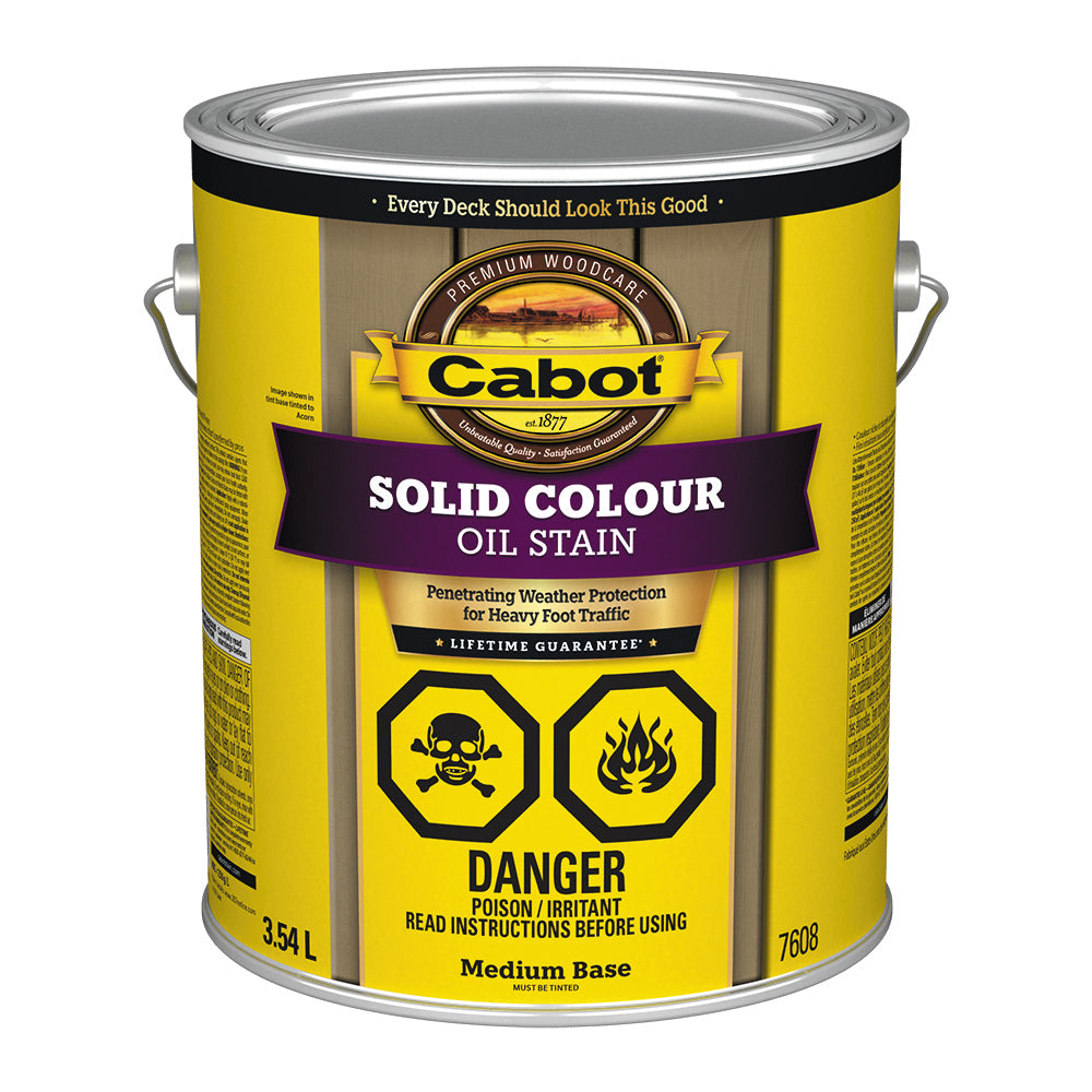 Image shows a 3.54L can of Cabot Solid Colour Oil Stain with a medium base. Label features include heavy foot traffic protection, a lifetime guarantee, and hazard warnings for toxicity and flammability.