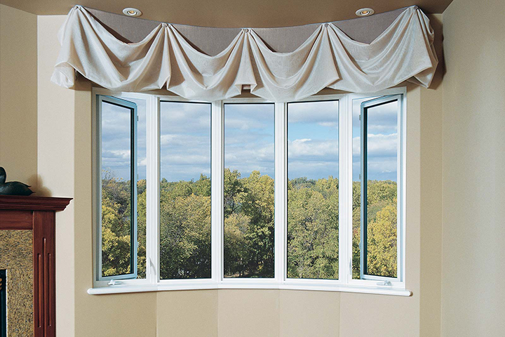 A beautiful bow window that is operable from the two outside panes from Turkstra Windows