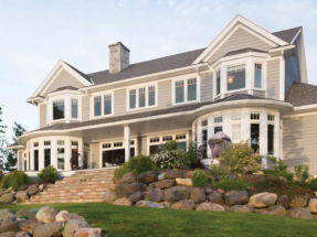 Fraser Beige Prefinished Wood Siding installed on a luxurious home