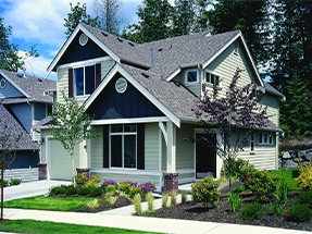 James Hardie Fiber Cement Siding on a quaint home with a beautiful garden