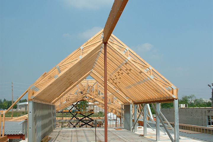 Scissor wood roof trusses manufactured by Turkstra Trusses and installed for a commercial building