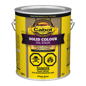 Image shows a 3.66L can of Cabot Solid Colour Oil Stain with a white base. The label includes warning symbols for poison and flammability, and it highlights weather protection for heavy foot traffic with a lifetime guarantee.