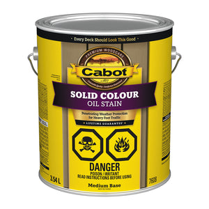 Image shows a 3.54L can of Cabot Solid Colour Oil Stain with a medium base. Label features include heavy foot traffic protection, a lifetime guarantee, and hazard warnings for toxicity and flammability.