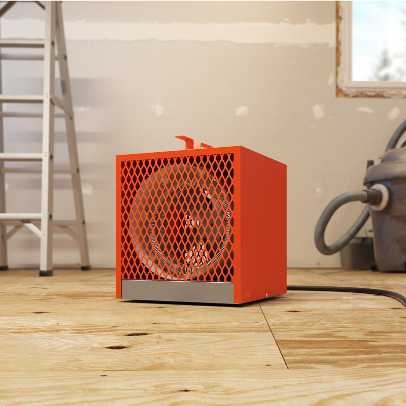 STELPRO DESIGN UCH Portable Heater, an orange portable construction heater with a diamond-patterned grille, resting on a wood floor.