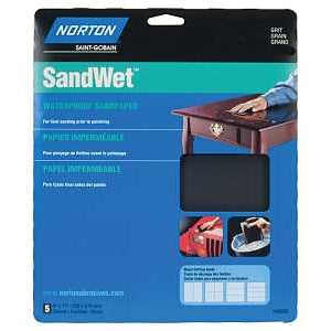 A package of Norton Super Fine 400 Grit Paper Sheets, with visible sheets inside and images of hands sanding a table and car part. The blue packaging displays white and yellow text.