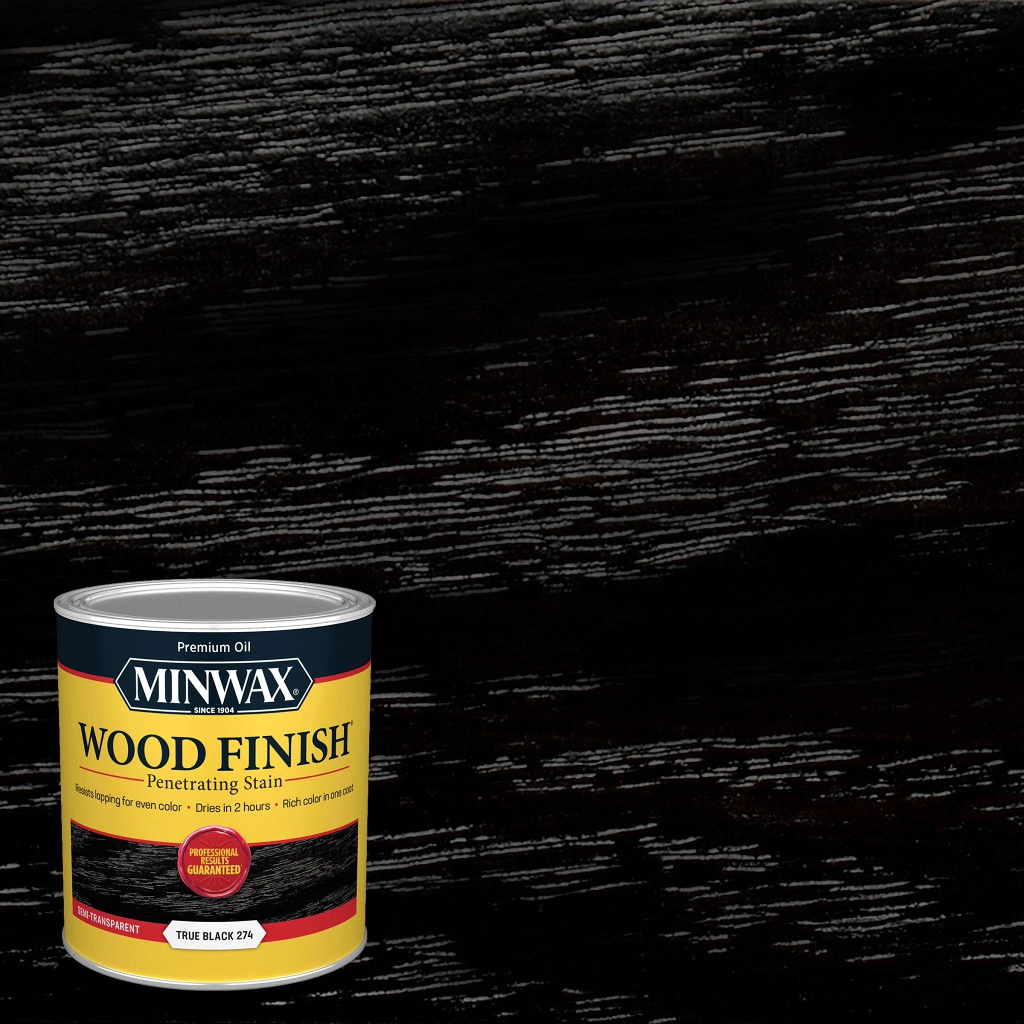A 946 ml can of Minwax Wood Finish in True Black by Sherwin Williams Canada (Minwax), displayed against a black-stained wood background that highlights the dramatic grain enhancement and modern finish provided by this premium black wood stain.