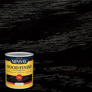 A 946 ml can of Minwax Wood Finish in True Black by Sherwin Williams Canada (Minwax), displayed against a black-stained wood background that highlights the dramatic grain enhancement and modern finish provided by this premium black wood stain.
