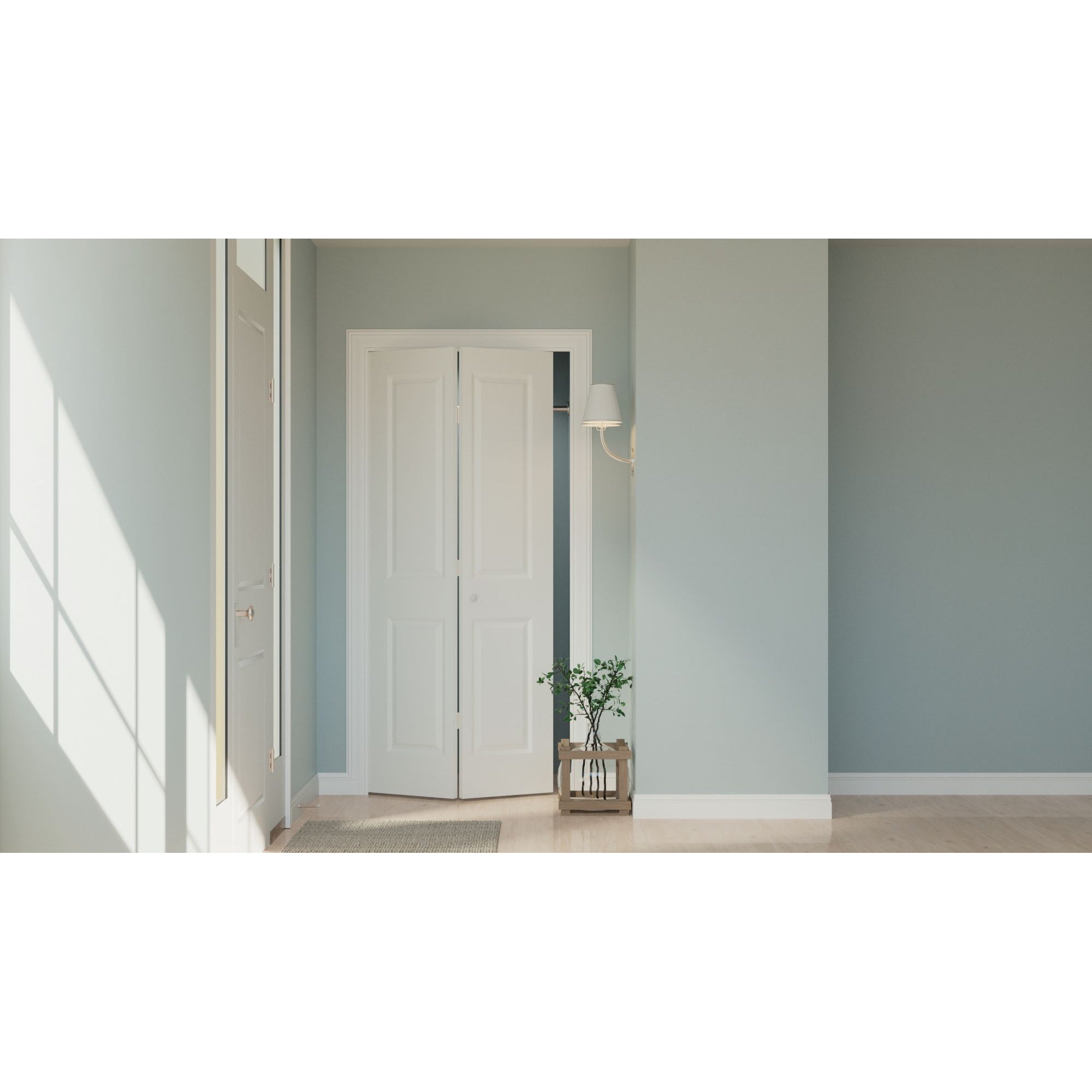 A bright, minimalist room with light blue walls, light wood floors, and a slightly open JELD-WEN 24"x80"x1-3/8" Carrara 2-Panel Square Smooth Bifold. Sunlight enters near a small plant in a wooden holder and a wall-mounted lamp.
