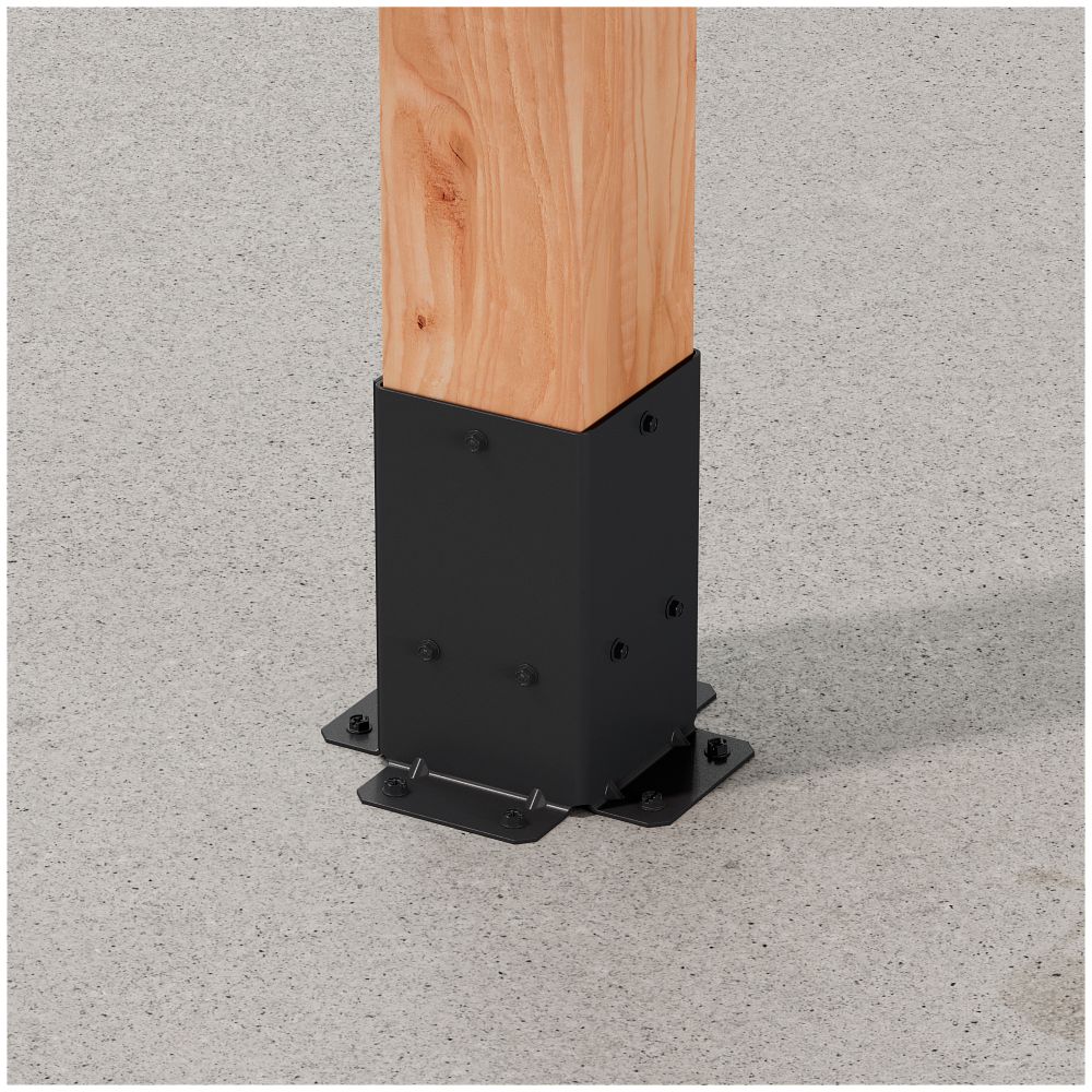 A 4x4 wooden post is anchored to a concrete surface with the Simpson Strong-Tie® Sage Post Base for 4x4 in black, providing stability and support—an ideal choice for outdoor pergola connectors or other projects needing a durable post base.