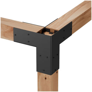 A detailed close-up of the Simpson Strong-Tie® Sage Corner Connector for 6x6, Black (2 per Pack), securely joining three wooden beams at a right angle. This corrosion-resistant connector is engineered for superior structural support in construction and furniture assembly, offering lasting durability as a reliable pergola hardware solution for both indoor applications and outdoor pergola connectors.