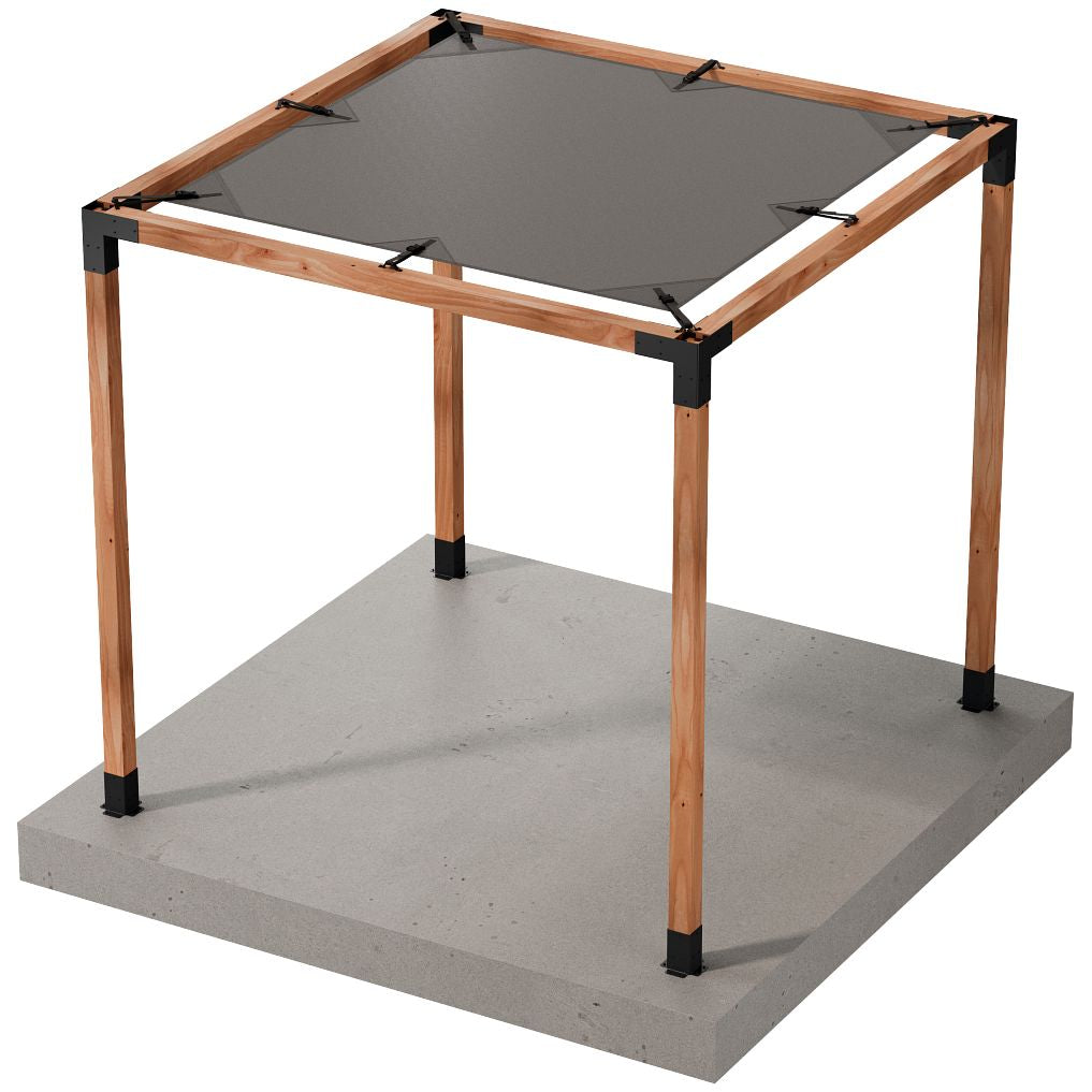 A square wooden pergola frame with four posts stands on a concrete slab, featuring a Sage Sunshade 8x8 in Gray from Simpson Strong-Tie® attached to the top for added UV protection.
