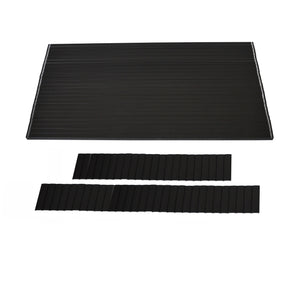 A large black rectangular mat with horizontal grooves, paired with two narrower matching strips below, resembling Regal Rail 10' Straight Pickets in Textured Black for 42" by Regal Rail and inspired by the Locking Picket System.