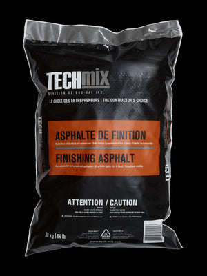 Bag of Techmix finishing asphalt on a black background